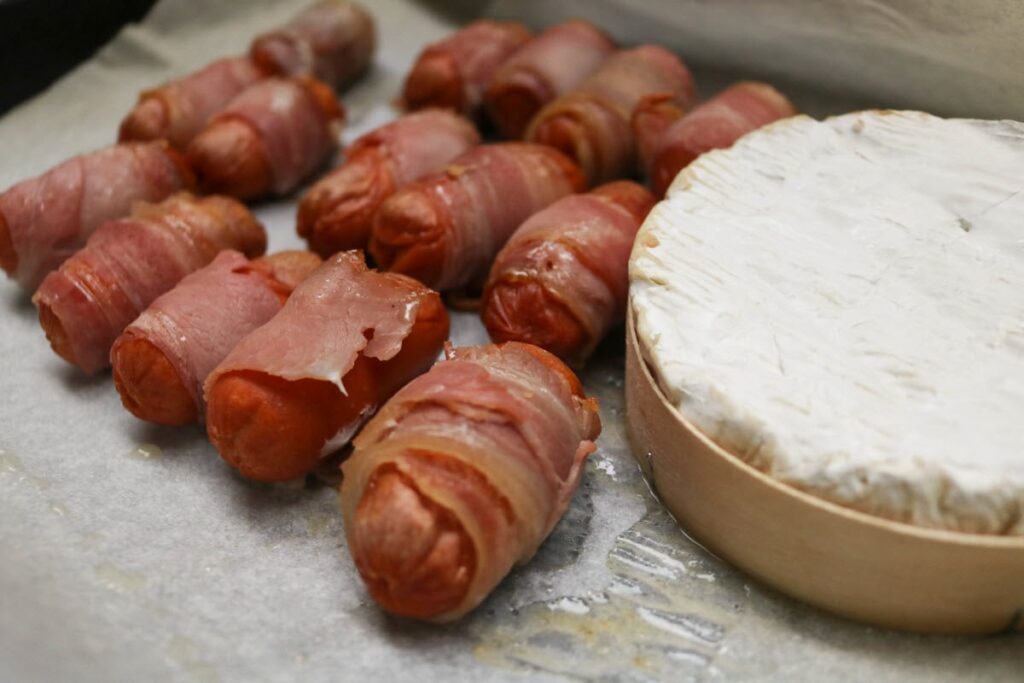 pigs in blanket keto recipe - cooked bacon-wrapped sausages