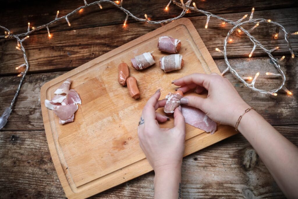 pigs in blanket keto recipe - slice bacon in half